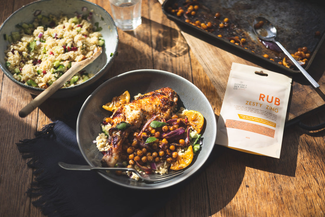 Spicy zesty chicken thighs and crunchy chickpeas with a couscous salad
